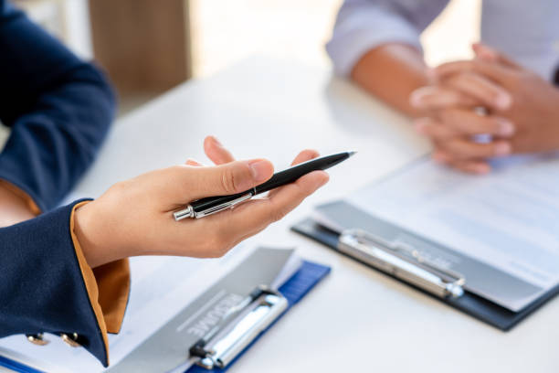 istock Job Interview and hiring concept, Appointment candidate Business women explaining about her profile and answer to Human resources manager sitting at a table opposite in the office 1218308498