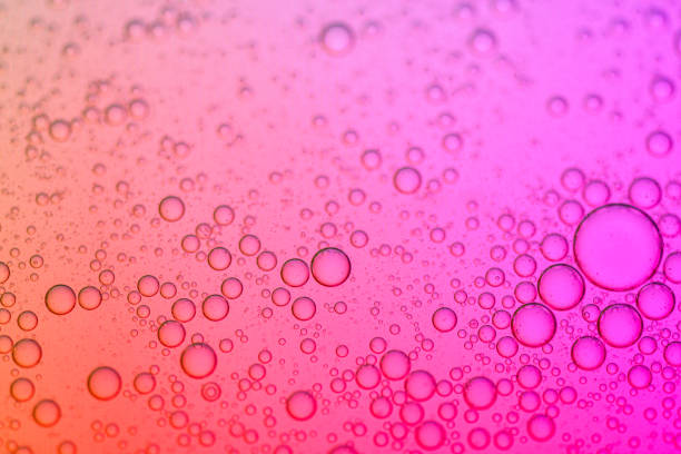 Oil bubbles on colourful background stock photo