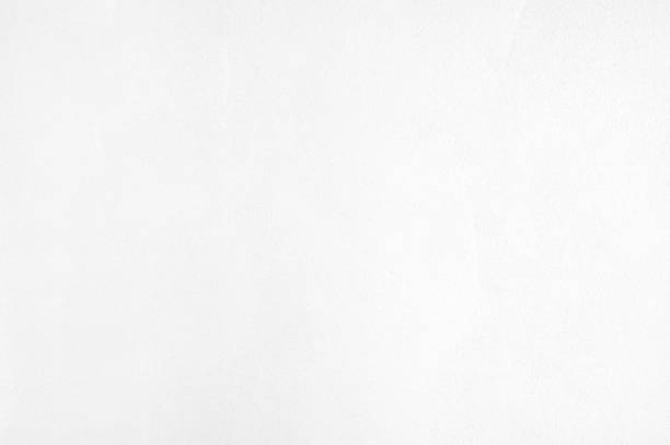 istock Blank concrete wall white color paint 1218315001