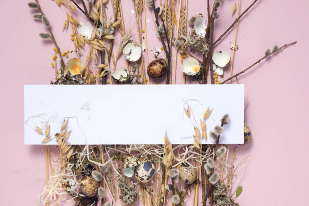 istock Collect easter composition on a pale pink background. Dried flowers and eggs for a beautiful greeting card. The concept of Easter decorative cards. Copy space. 1218316064