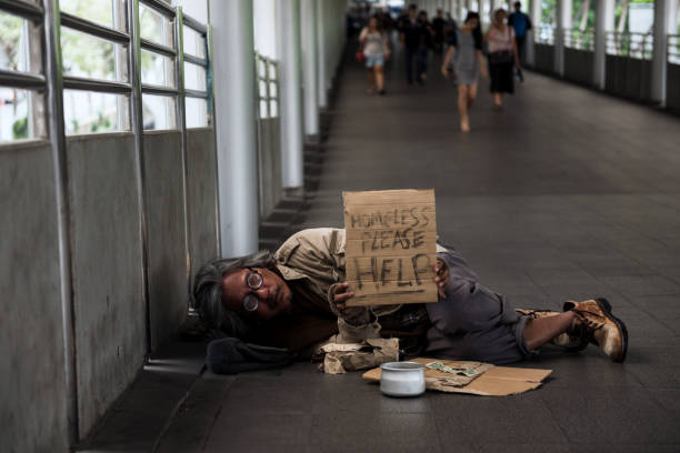 istock Old Homeless man need help during covid-19 1218317549