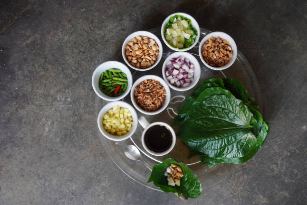 istock Miang kham translates to “eating many things in one bite”-Miang (food wrapped in leaves) and kham (a bite). 1218318706