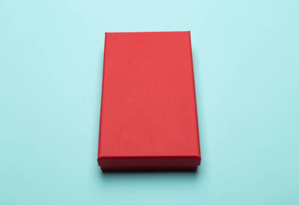istock Red box product packaging isolated on blue background 1218321650