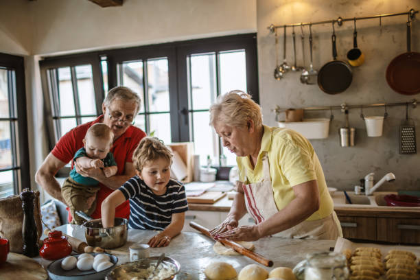 istock Grandparents baking together with grandsons 1218332519