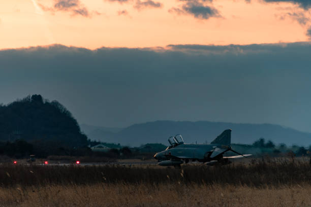 istock Military air base at sunset 1218333290