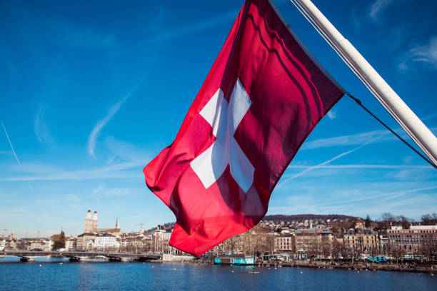 istock Swiss flag waving in the wind 1218333776