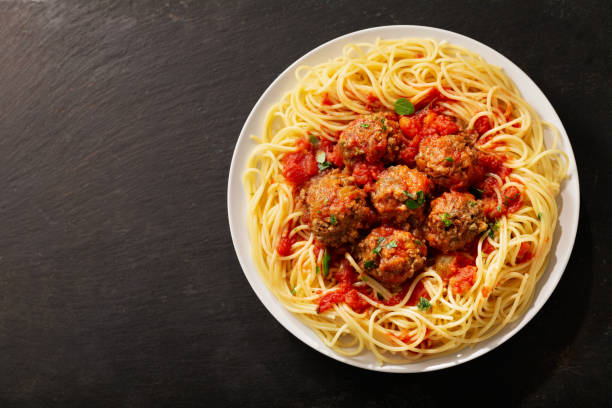 istock plate of pasta with meatballs, top view 1218338002
