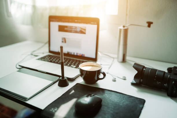 istock Cappuccino coffee and laptop on the desk 1218339261