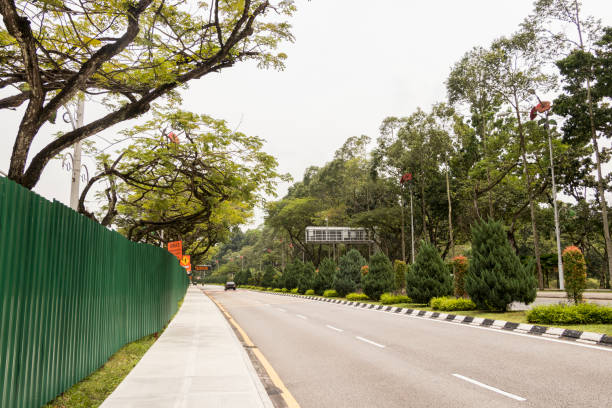 istock Road between nature and construction site in Kuala Lumpur, Malaysia. 1218341389