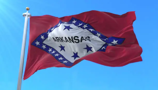 Flag of Arkansas state, region of the United States, waving at wind