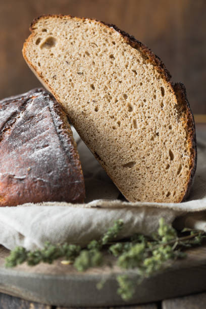 istock Sourdough cutting bread. Freshly baked organic wheat bake. 1218343827