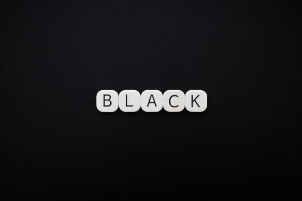 istock Alphabet BLACK word block with BLACK background. 1218348281