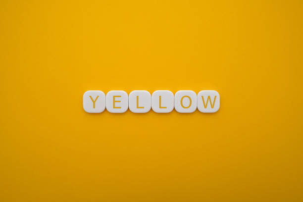 istock Alphabet YELLOW word block with YELLOW background. 1218348287