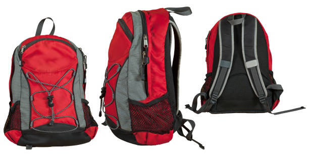 Travel backpack isolated on a white background. Red filled bag closeup.