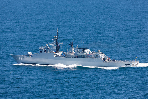 Sydney, Australia - October 11, 2013: KD Jebat (F 29) Lekiu-class guided missile frigate serving in the Royal Malaysian Navy departing Sydney Harbor.