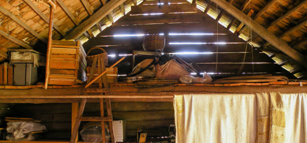 attic with rubbish in an abandoned barn