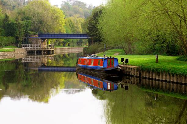 istock Symmetrical reflections on Sprotbrough Flash, in April 2020. 1218356258