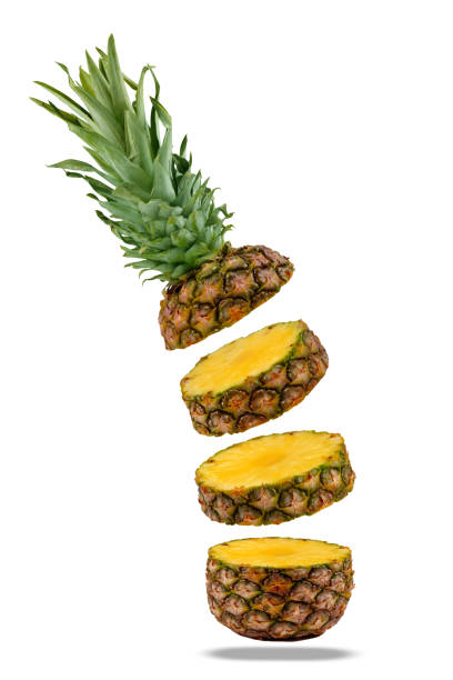 istock Flying fresh ripe pineapple slices isolated on a white background. 1218356434