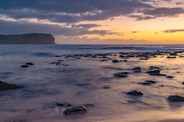 istock Dawn Seascape, Headland and Cloudy Sky 1218357897