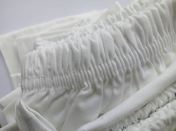 istock pile of white stretchy pants 1218360210