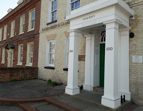 Facade of old grand imposing buildings on the high street. Spring day. Billericay, Essex, United Kingdom, April 12, 2020