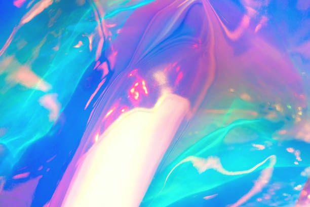 istock Abstract trendy rainbow colored blurred holographic background 1218361144