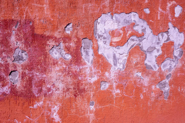 istock pale color and peeling of painted pink cement wall texture background 1218361992