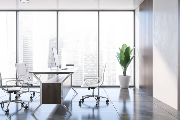 istock White and wooden manager office interior 1218362093
