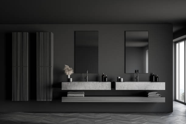 istock Double sink and cabinets in grey bathroom 1218363563