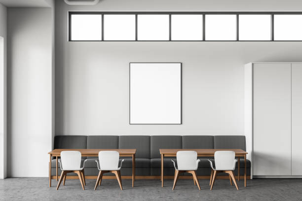 istock Gray sofa in modern cafe interior with poster 1218365136