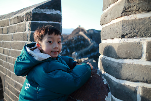 Boy hiking on the great wall