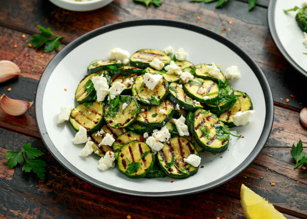 istock Warm salad with grilled zucchini, garlic and herbs 1218366483