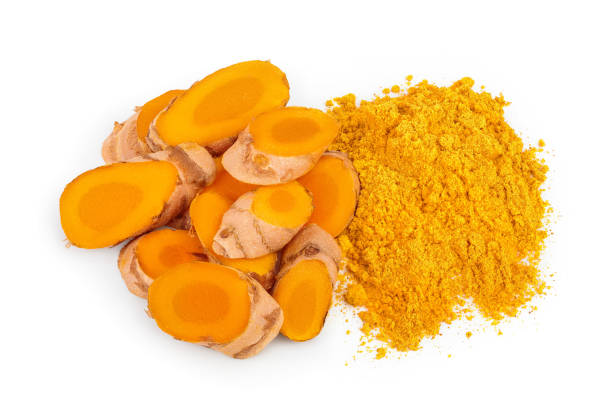istock Turmeric powder and turmeric root isolated on white background. Top view. Flat lay 1218366617