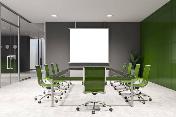 istock Green and gray meeting room with mock up screen 1218366917
