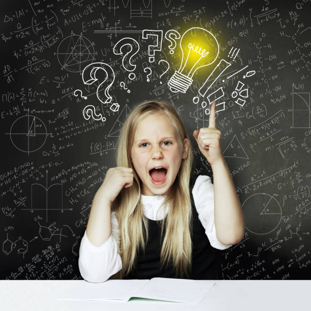 istock Child girl thumbs up and lightbulb. Concept Ideas and projects 1218367713