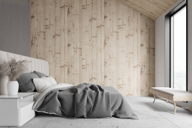 istock Wooden and gray attic bedroom interior 1218367772
