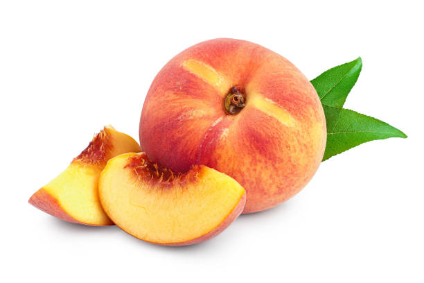 istock Ripe peach fruit and slice with leaf isolated on white background 1218367828