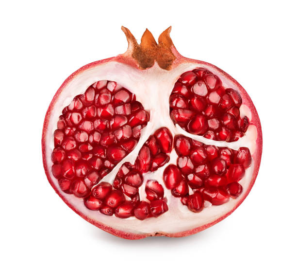 istock Pomegranate half isolated on white background with clipping path and full depth of field. 1218367891