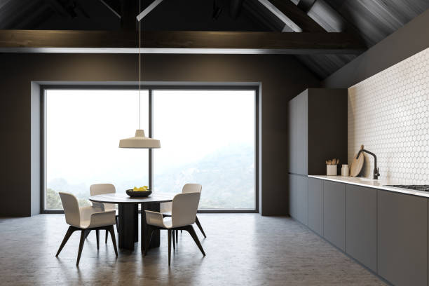 istock Luxury attic kitchen with countertops and table 1218367954