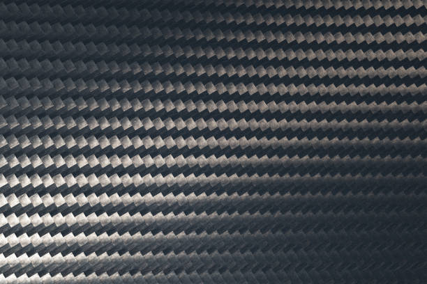 istock Macro photo of grey carbon fiber pattern texture surface. 1218368571