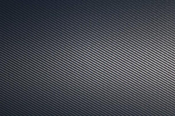 istock Carbon fibre sheet background texture 1218368785