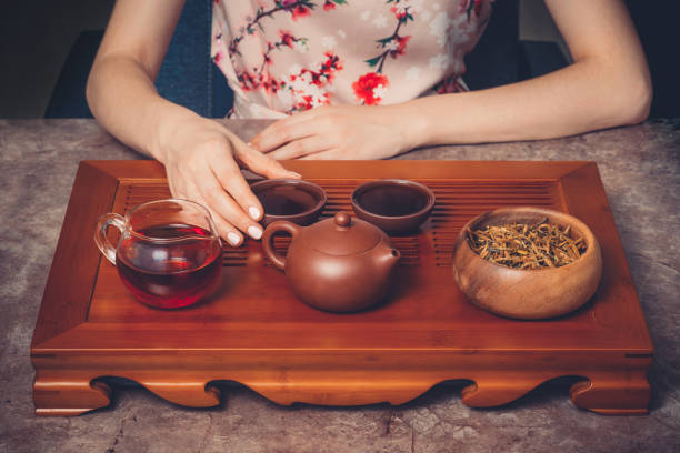 istock The tea ceremony. The woman is drinking tea 1218369808