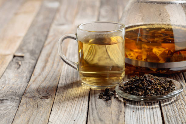 istock Hot green tea in glass mug. 1218369900