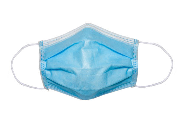istock isolated surgical mask on white background 1218372775