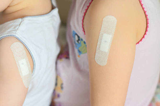 istock Children with patch on forearm after tuberculosis vaccine 1218374970