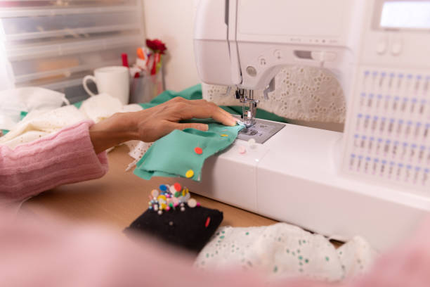 istock Japanese woman making mask at home 1218375039