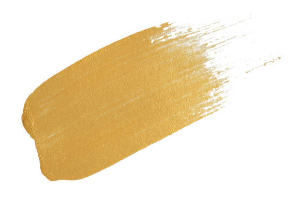 istock gold texture paint stain on white background 1218375853