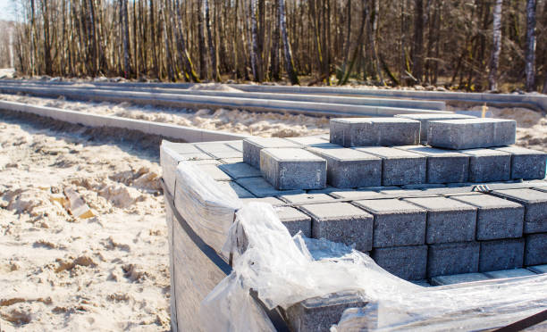construction of a new modern road in the forest on sunny spring day