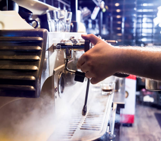 istock The bartender makes the coffee, cappuccino, cocoa, drink at the bar. 1218377067