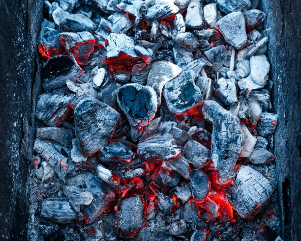 istock Red-hot firebrands in a bonfire. 1218381881